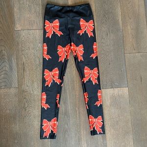 GoldSheep ribbon print leggings black and red size medium